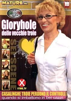 Slutty mature lady with glasses worships <b>glory hole</b> cocks. . Grandma gloryhole
